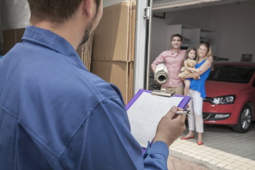 Professional packers organizing items for a move